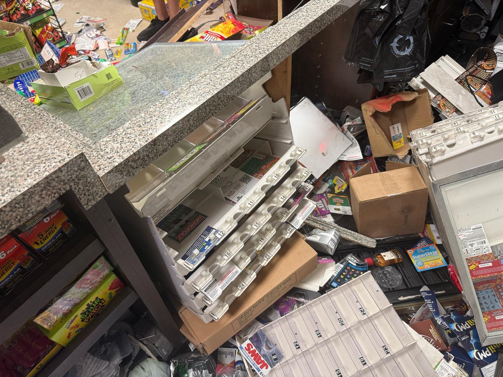 Dozens of looters destroyed our family store campaign photo, 4 of 8