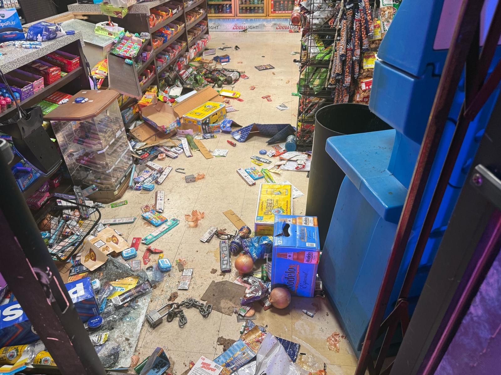 Dozens of looters destroyed our family store campaign photo, 7 of 8