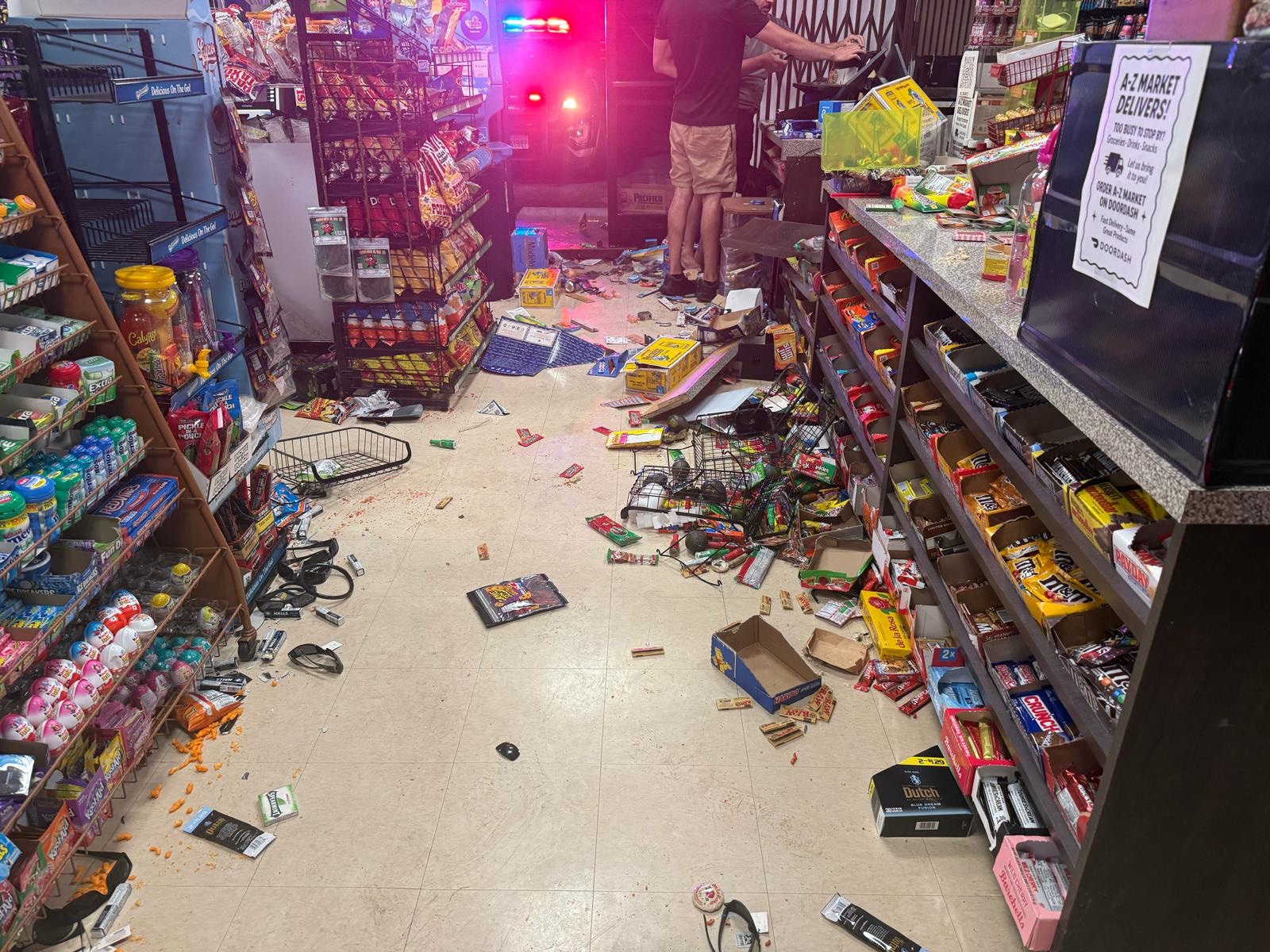 Dozens of looters destroyed our family store campaign photo, 6 of 8
