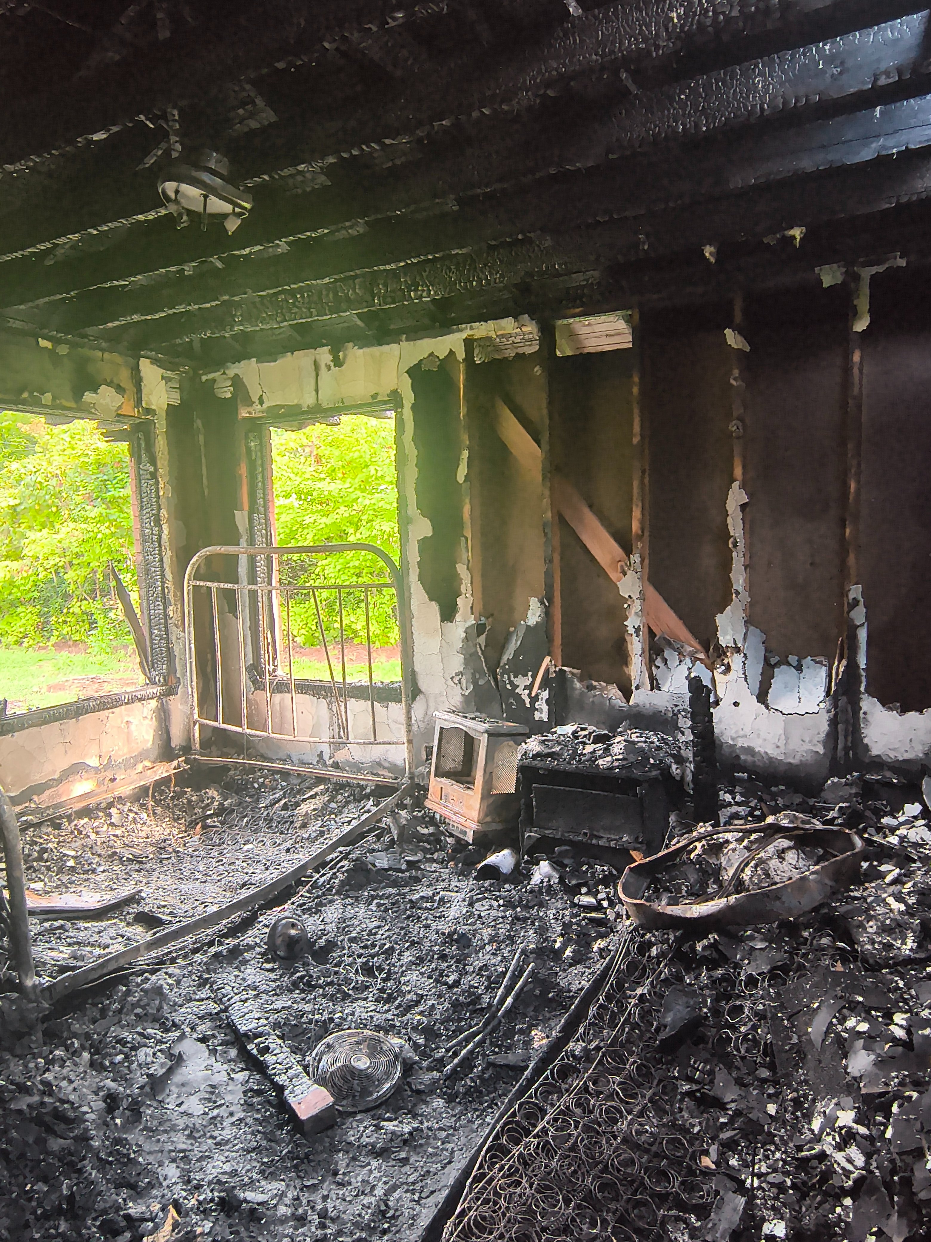 Help my parents start over after devastating fire campaign photo, 6 of 9
