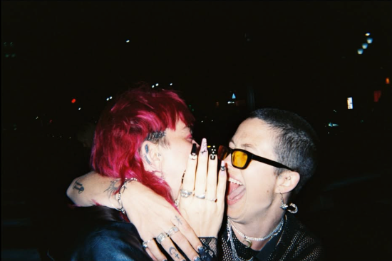 Lexi stay home with their partner & queer family campaign photo, 6 of 7