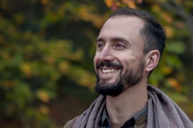 Help Andrew restart life in the USA photo