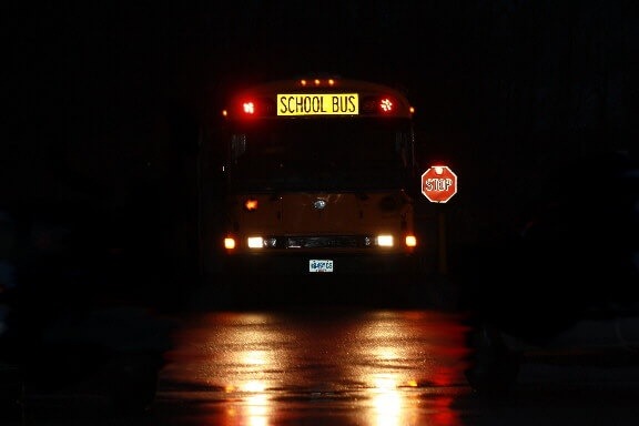 Family of 3 kids killed at bus stop photo