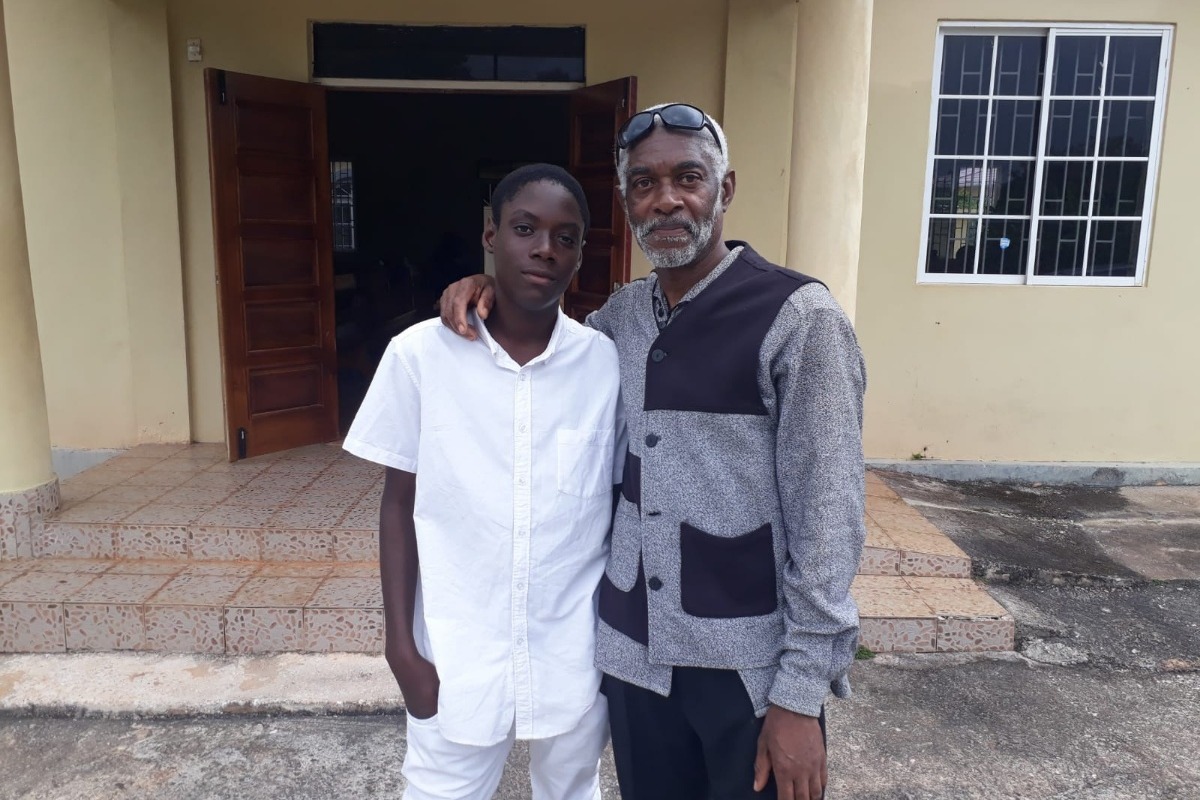 Reunite Windrush victim with his son photo