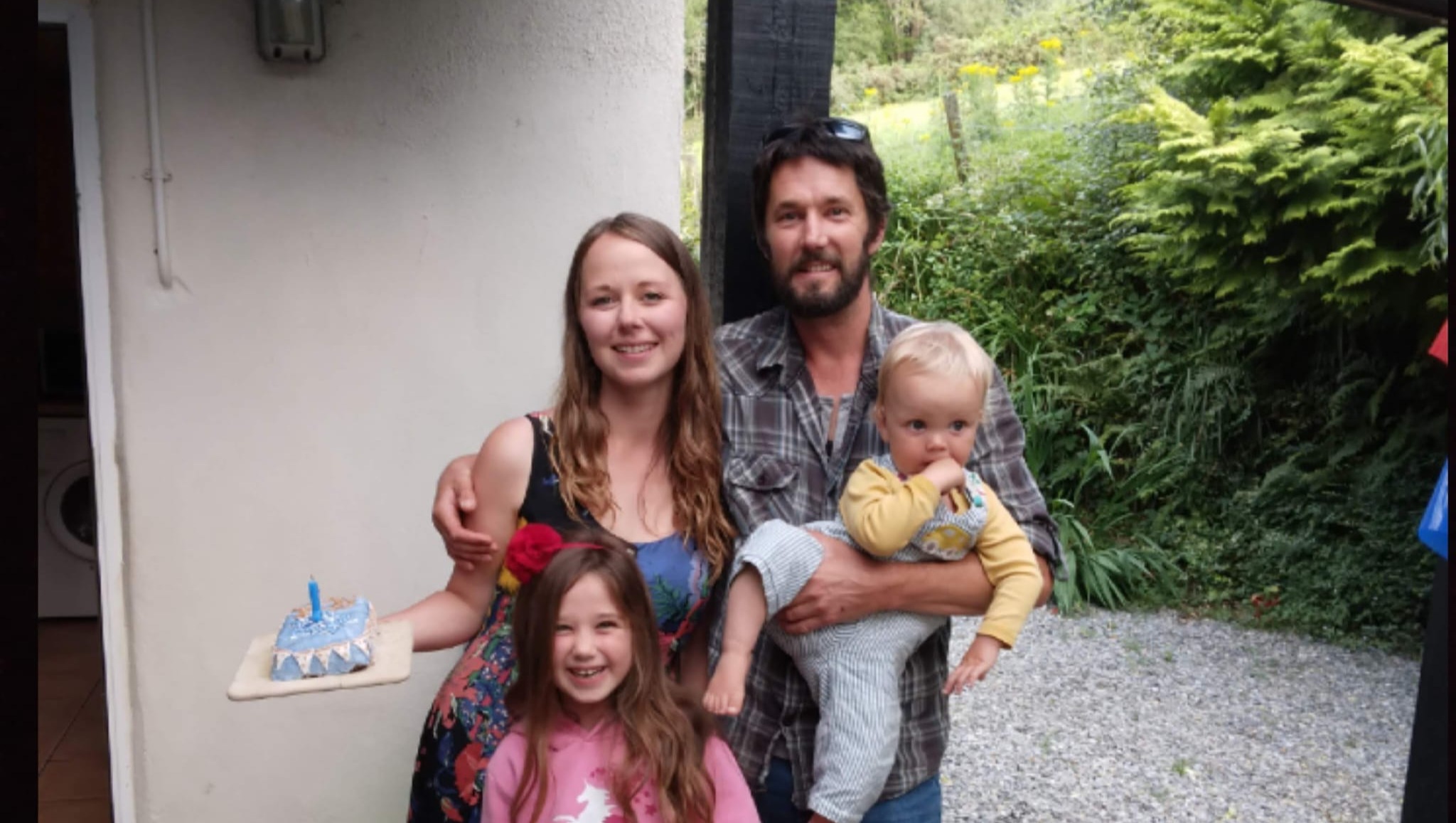 Aidan, Jeannie and their family home photo