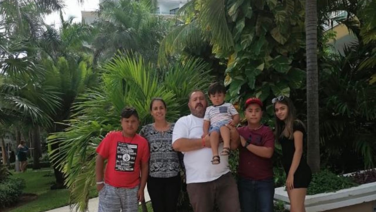 The Mendoza family together at a football event