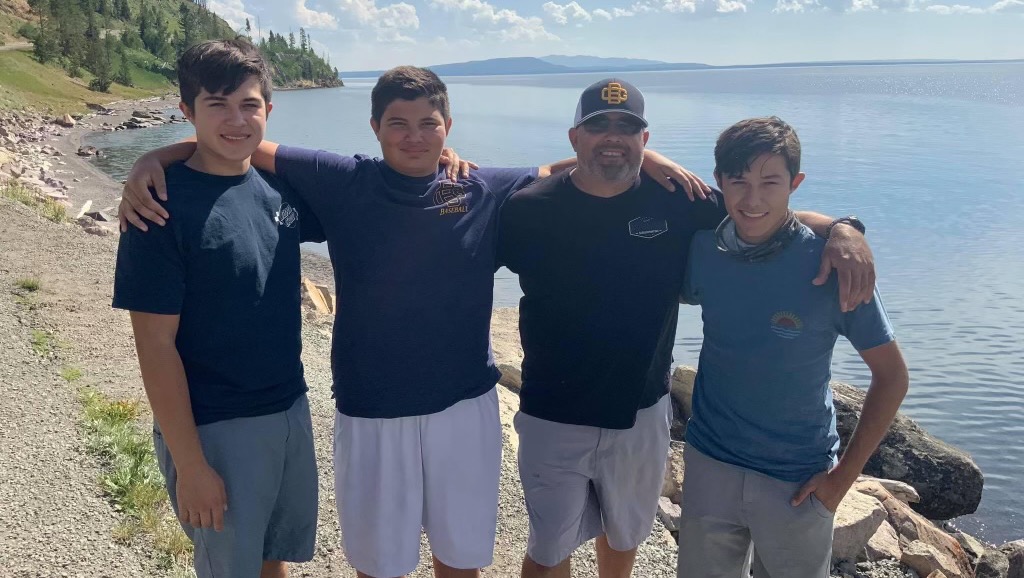 Support Officer Martinez and His Sons After Tragic Fire photo