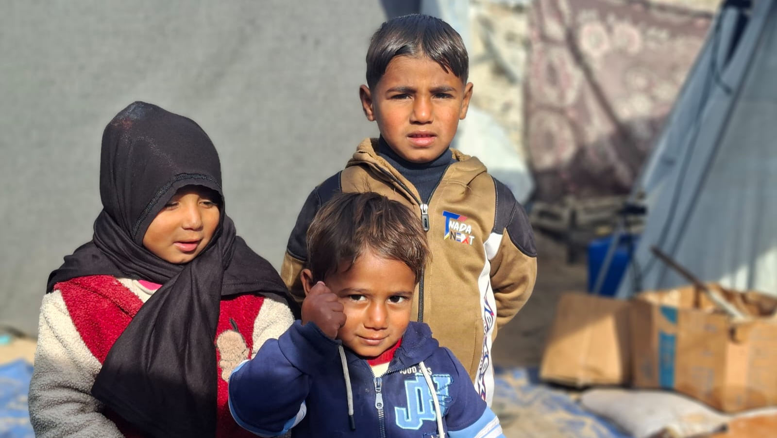 Bring back their smiles. Help give them a future. photo