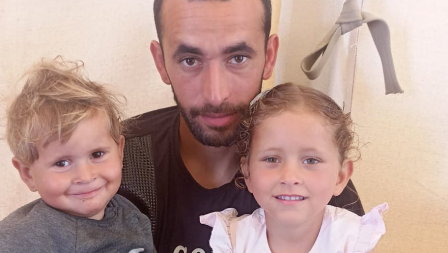 Help me and my family . We are in critical condition in war photo