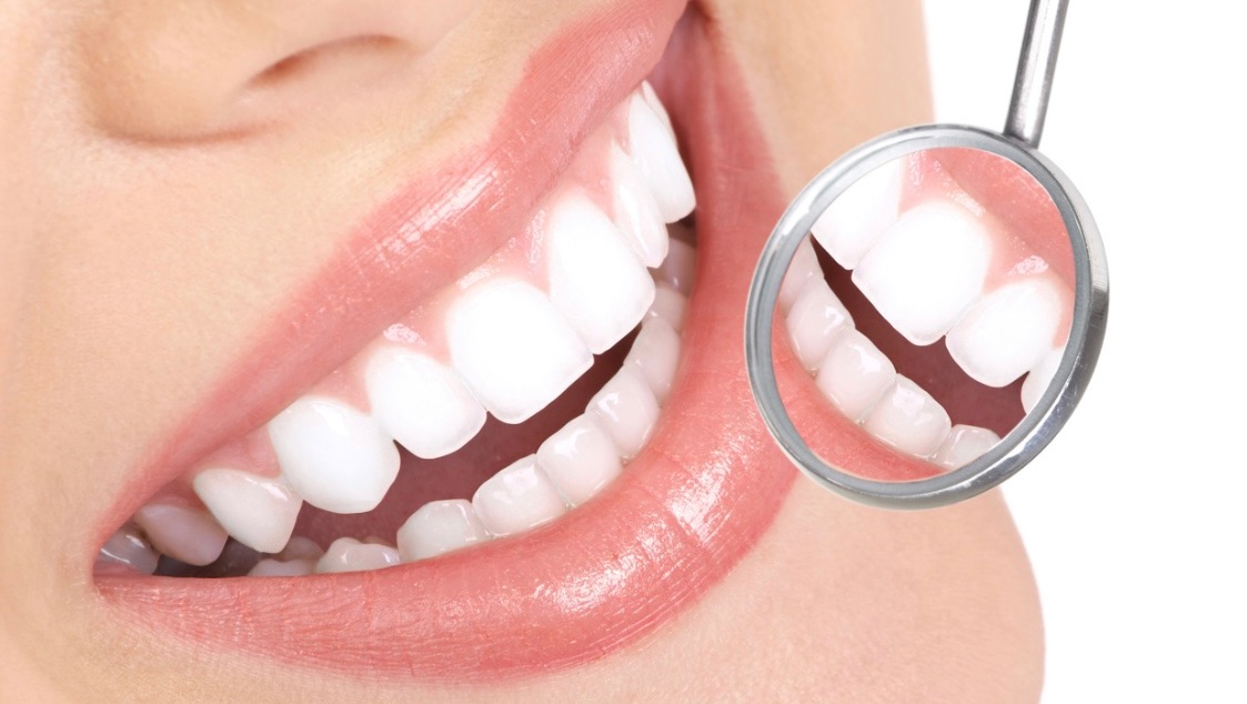 Help give this selfless momma a new smile!! photo
