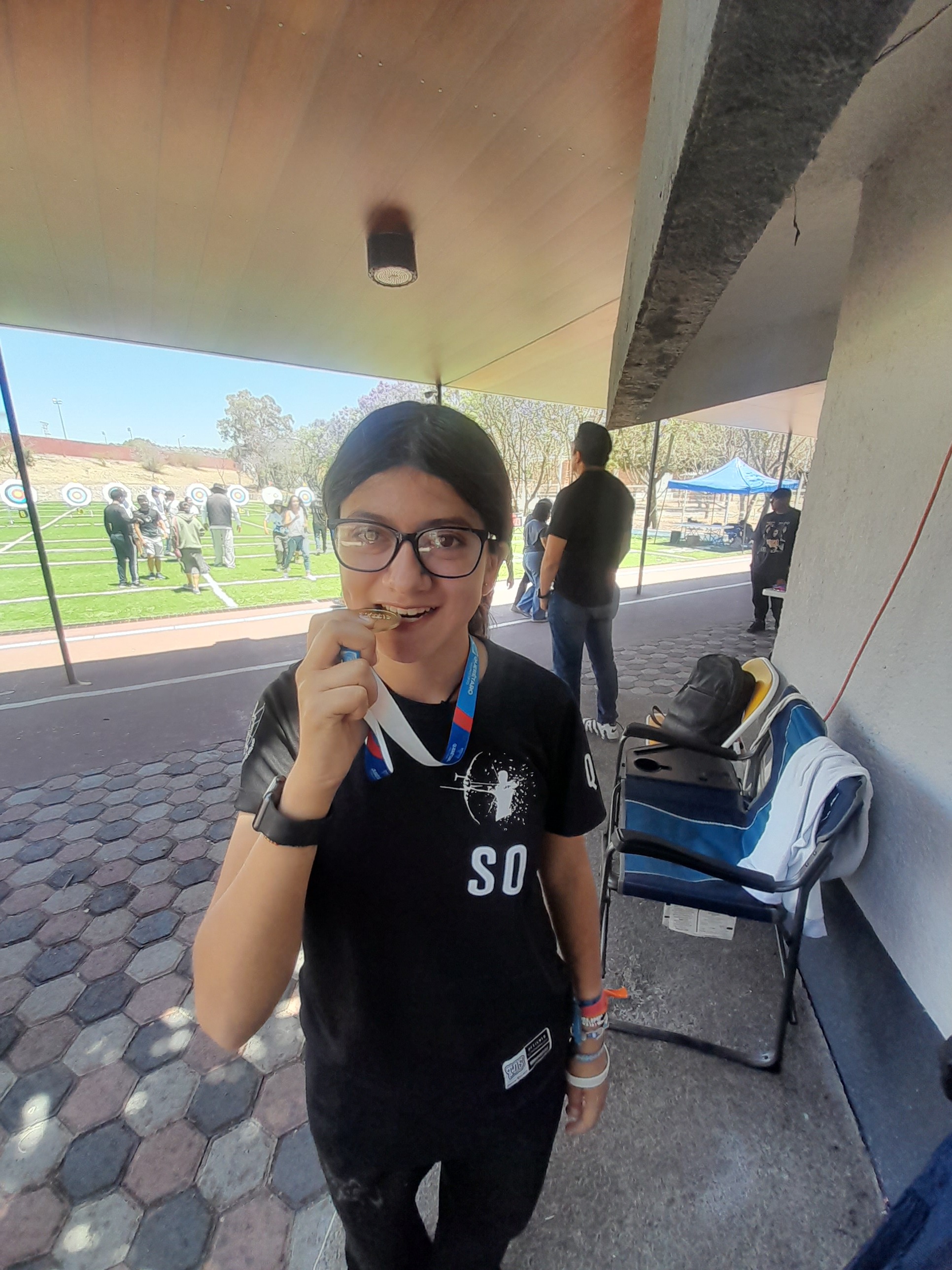 ¡Ayúdame en mi carrera deportiva de tiro con arco! campaign photo, 7 of 8