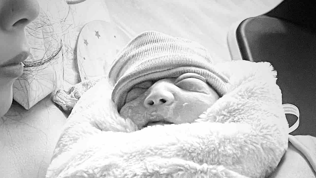 Mavis's Journey: Love for her Baby Boy with Anencephaly. photo