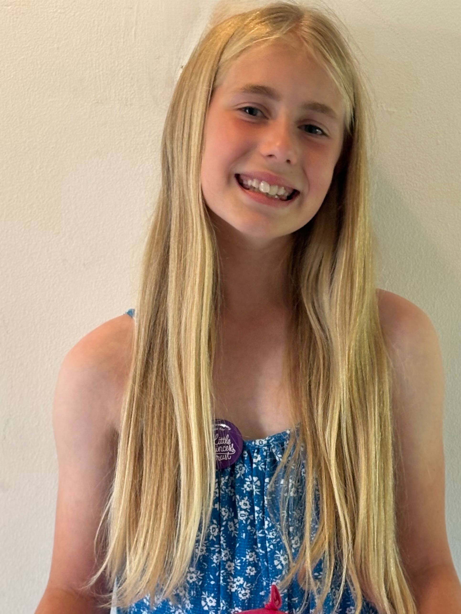 Flo’s hair donation fundraiser campaign photo, 5 of 6