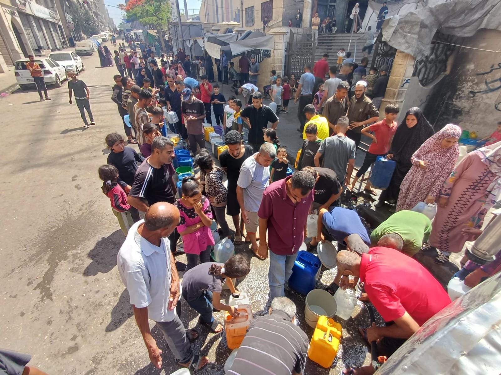 Donate to deliver food and water to children and the poor in campaign photo, 2 of 5