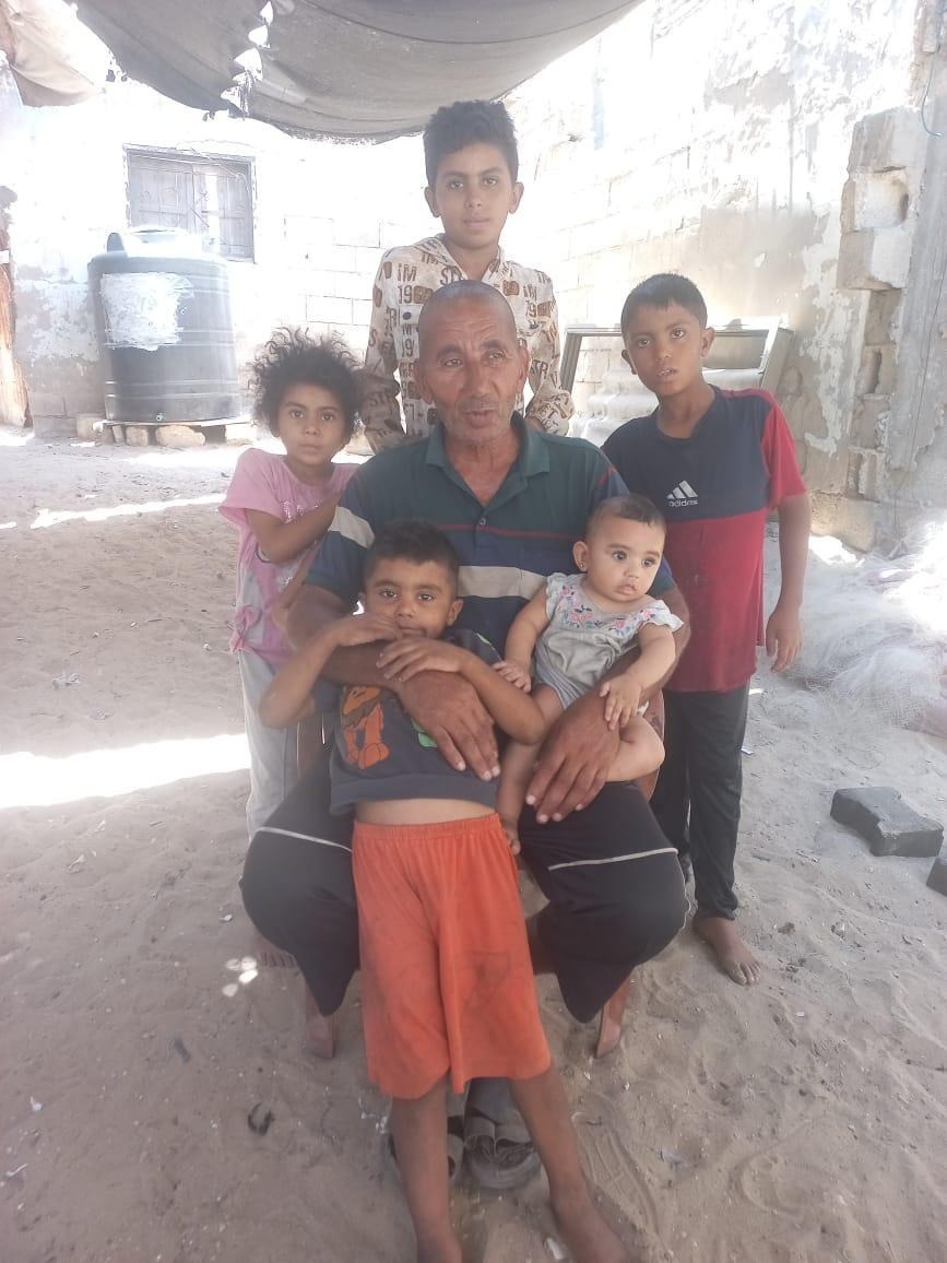 Nahed, a 57 year old Father and his young family in Gaza campaign photo, 2 of 4