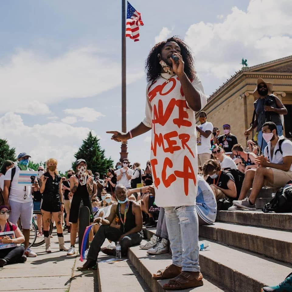 Black nonbinary community activist in dire need campaign photo, 2 of 6