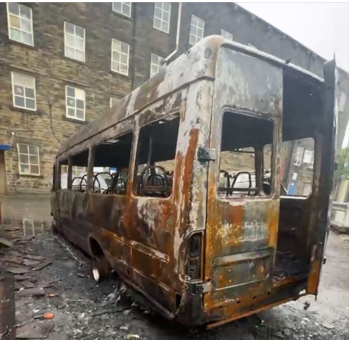 Alfs Black Belt Academy Minibus burnt out campaign photo, 5 of 7