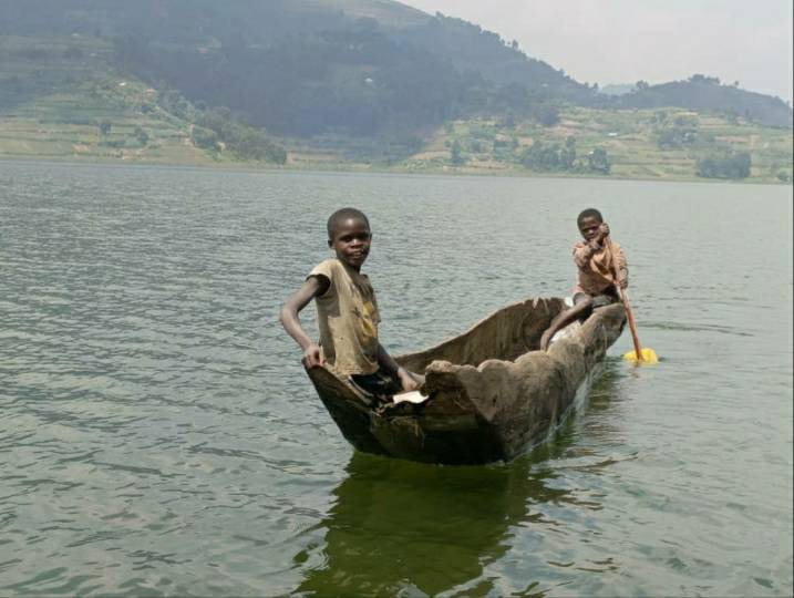 Motorboat for Bukome island on Lake Bunyonyi, Uganda campaign photo, 6 of 7