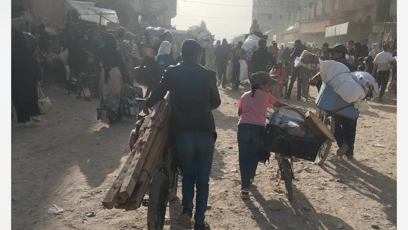 Mustafa Qudaih and his family