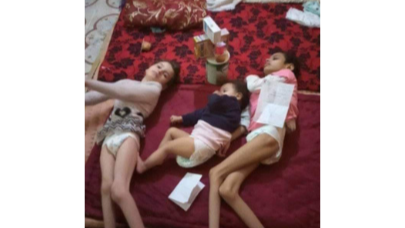 منارتكافح وحيدة لإنقاذ 4 أطفال أيتام – 3 منهم معاقون photo