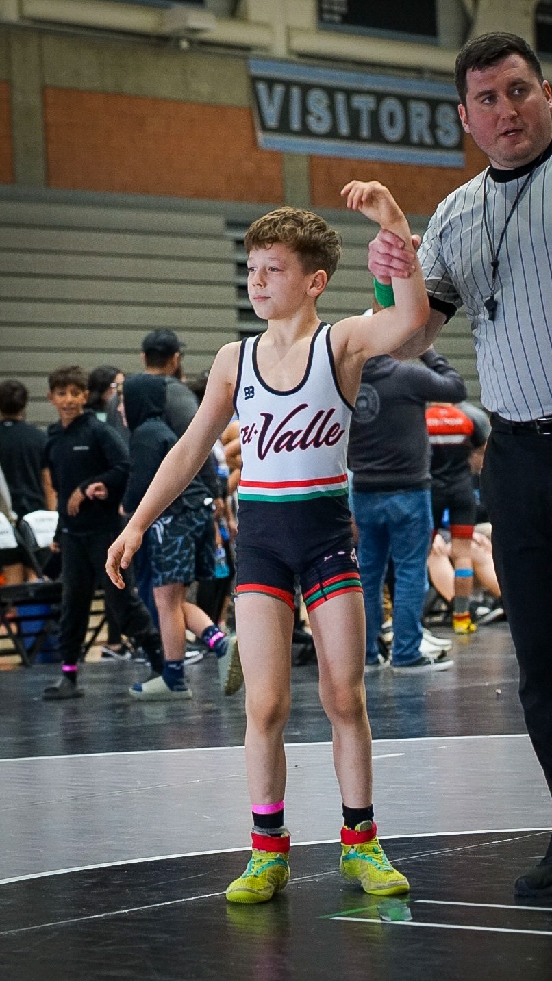 "Back Quintin's Journey, Build a National Champion" campaign photo, 4 of 6
