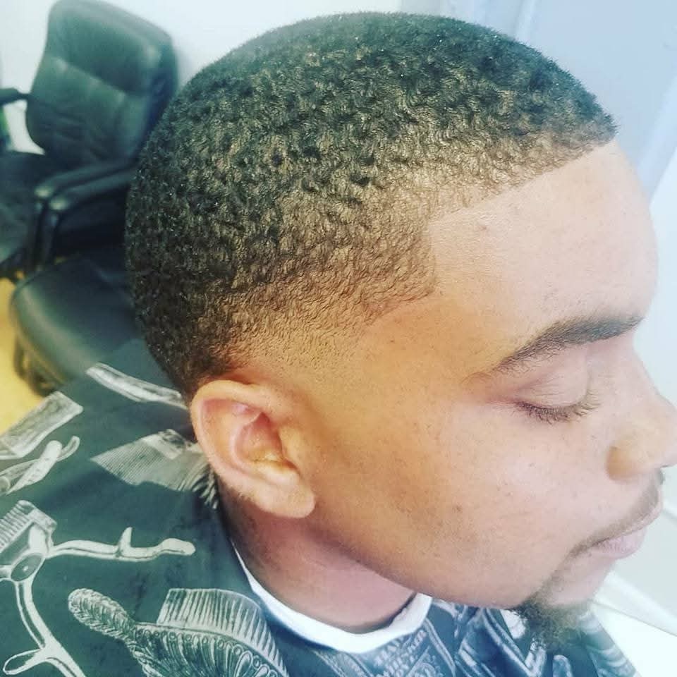 Building a legacy one haircut at a time campaign photo, 4 of 6