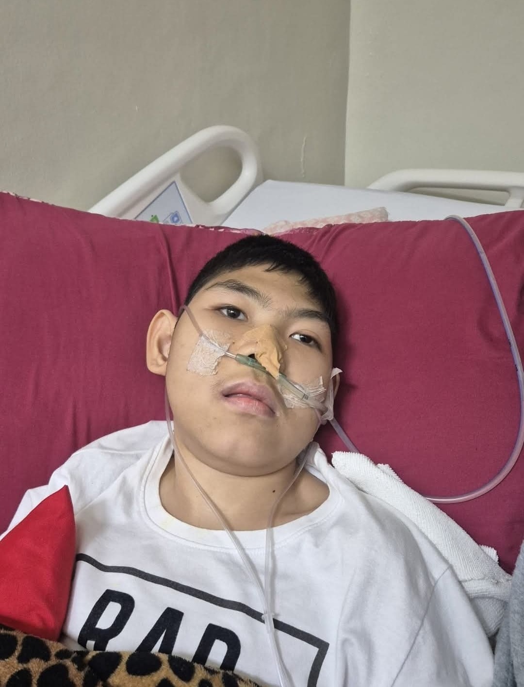 Help my wife to pay her son's medical bills. campaign photo, 2 of 7