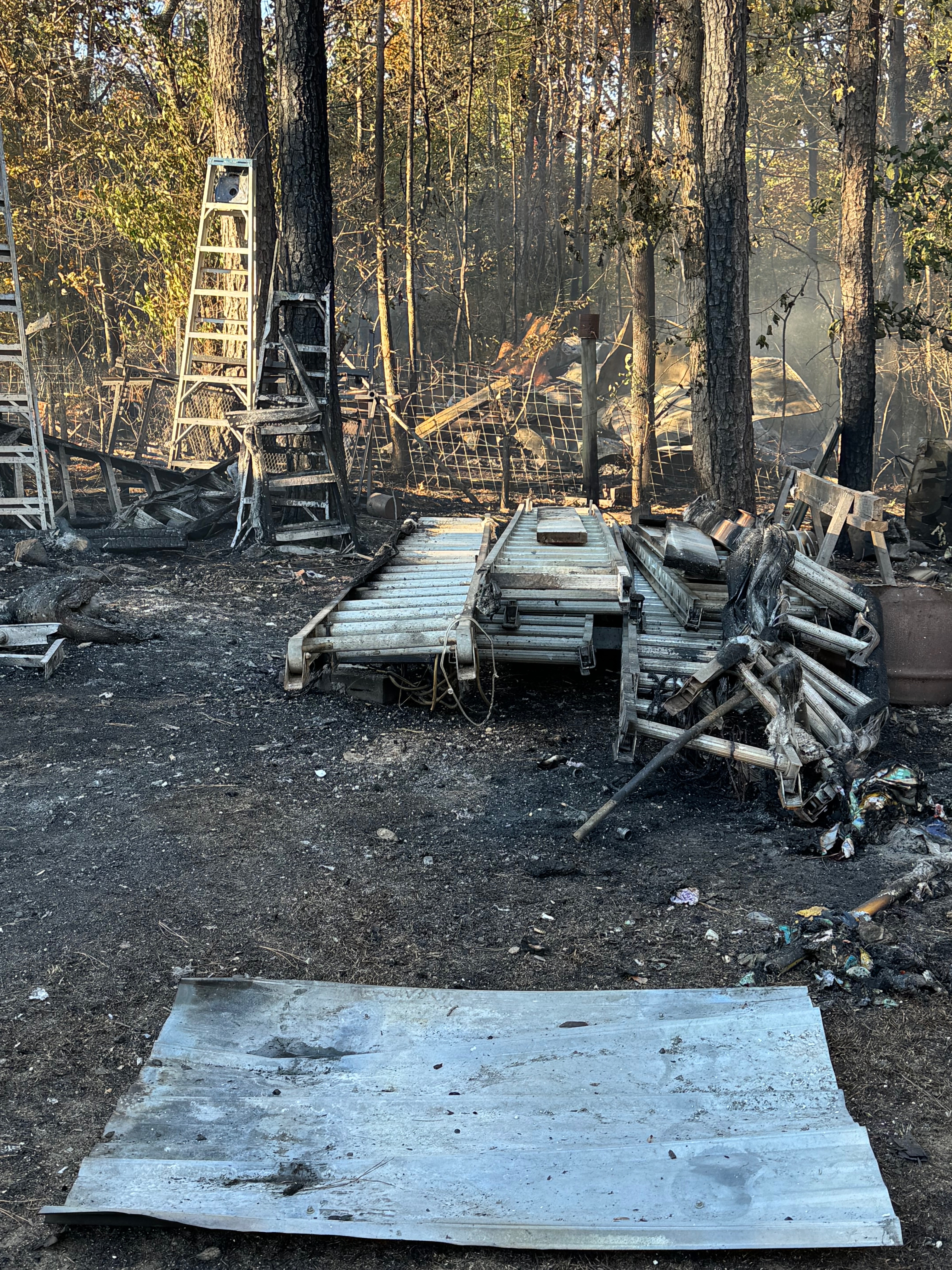Help my parents rebuild business tools after fire campaign photo, 2 of 7