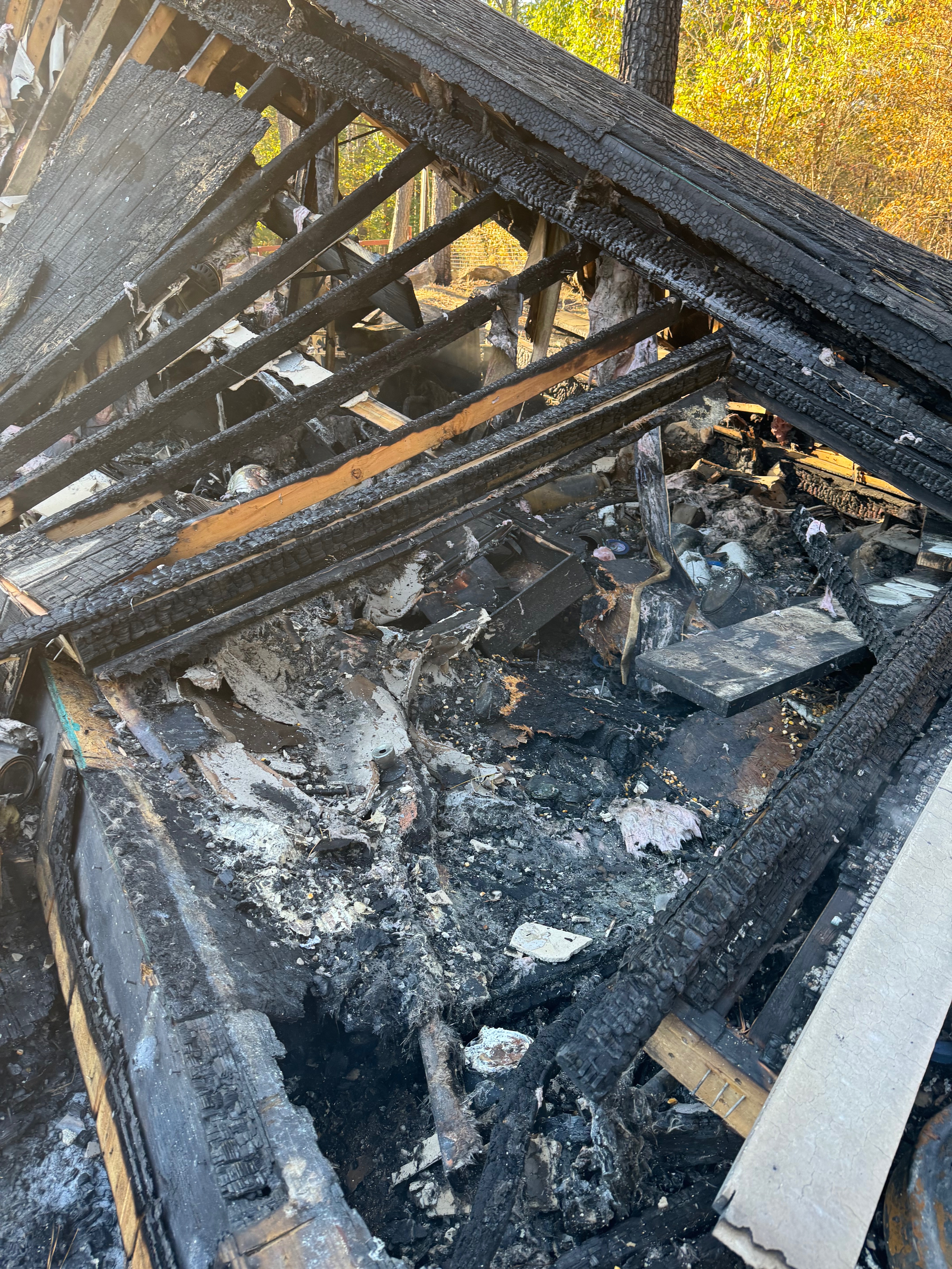 Help my parents rebuild business tools after fire campaign photo, 4 of 7