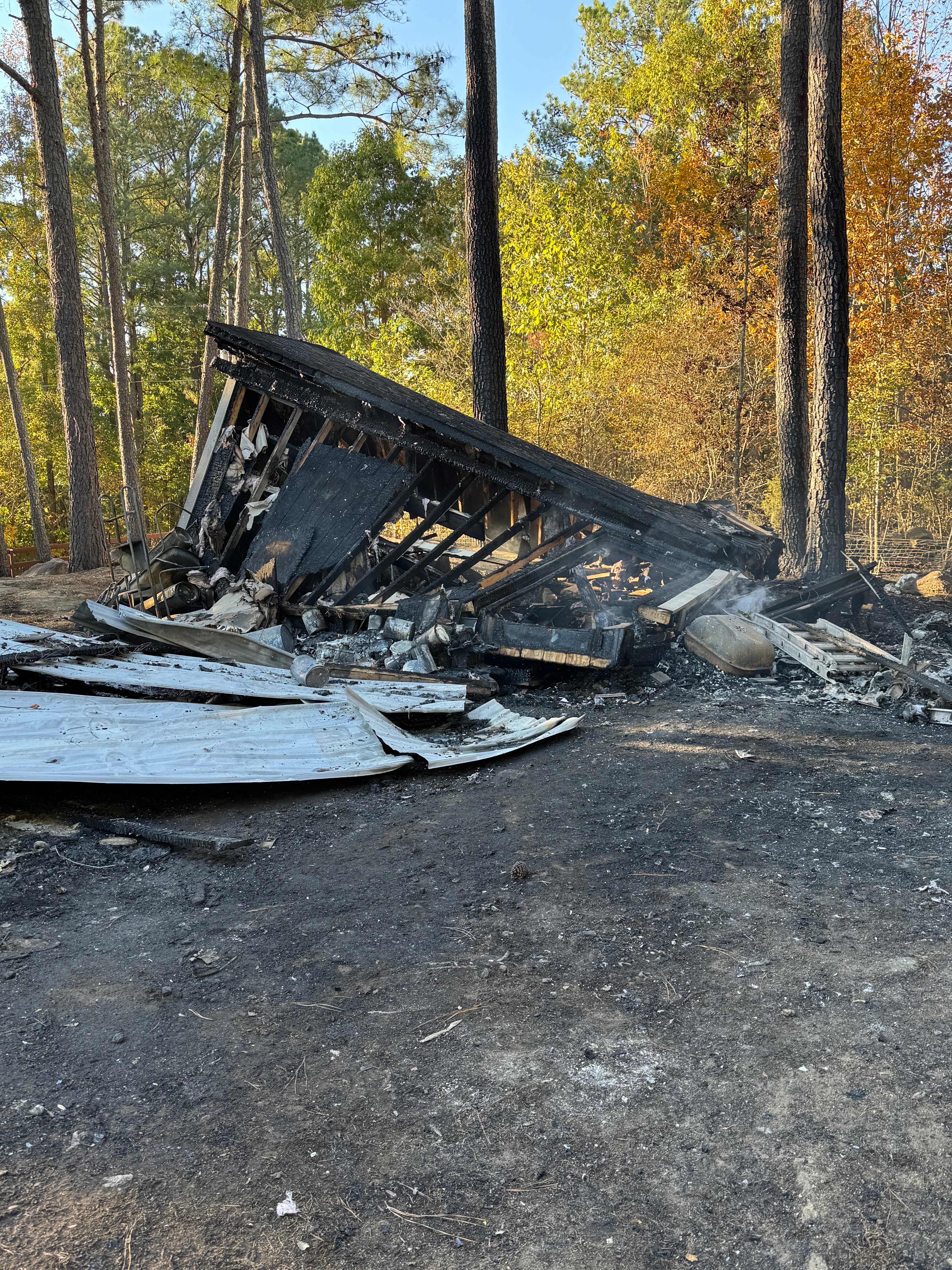 Help my parents rebuild business tools after fire campaign photo, 5 of 7
