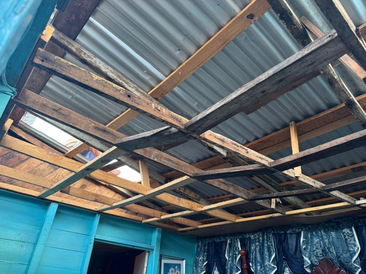 This is to help Assaney and his family rebuild their roof campaign photo, 2 of 8