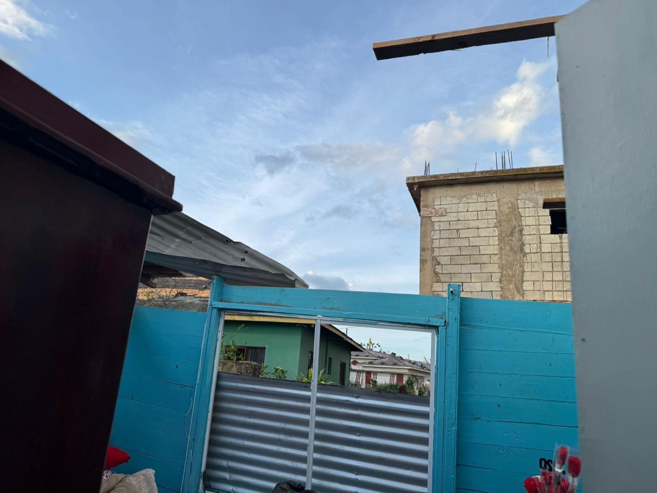 This is to help Assaney and his family rebuild their roof campaign photo, 5 of 8