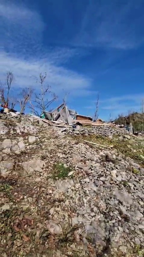 A elderly family who lost their home to hurricane Melissa campaign photo, 4 of 6