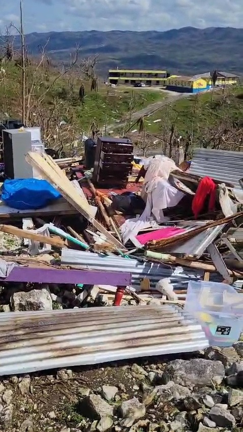 A elderly family who lost their home to hurricane Melissa campaign photo, 2 of 6