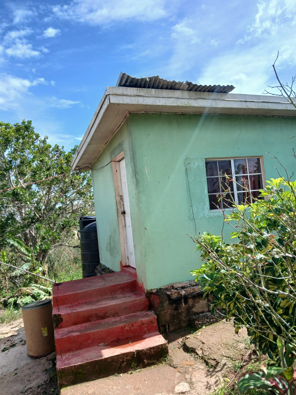 Help Roger's Mother Rebuild After Hurricane campaign photo, 2 of 5