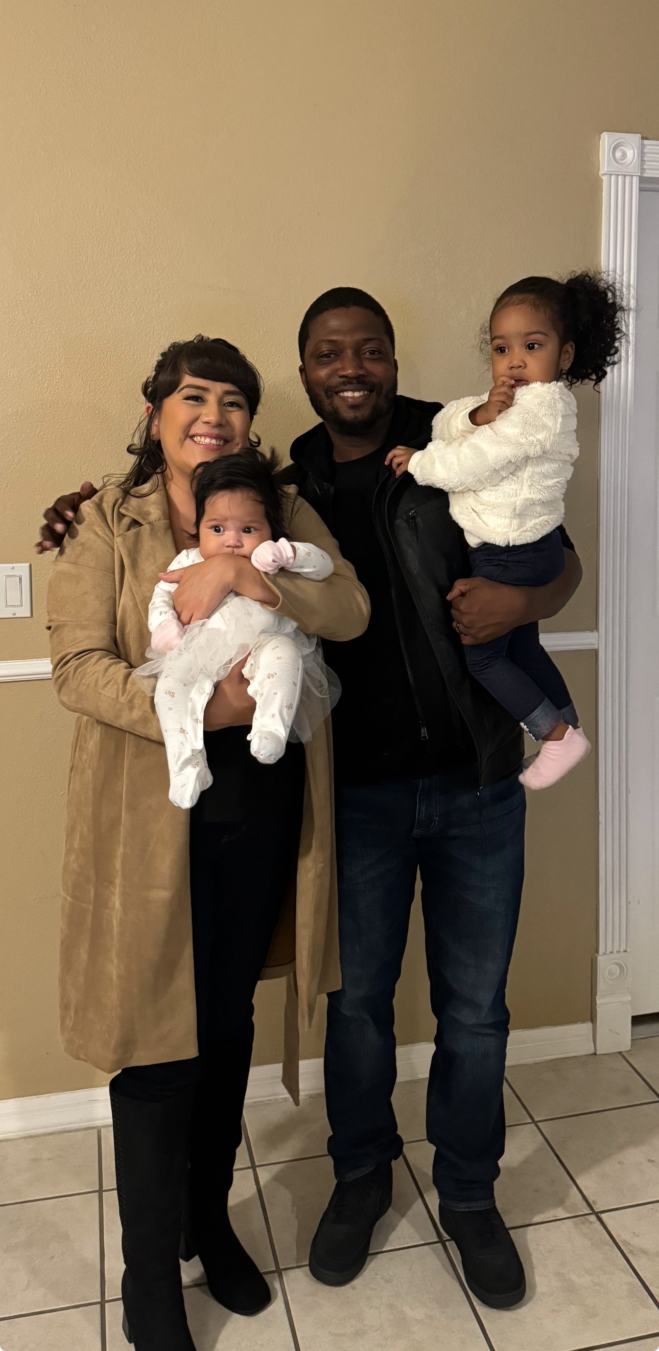 Honoring Adedamola-supporting his wife and two children. campaign photo, 4 of 4