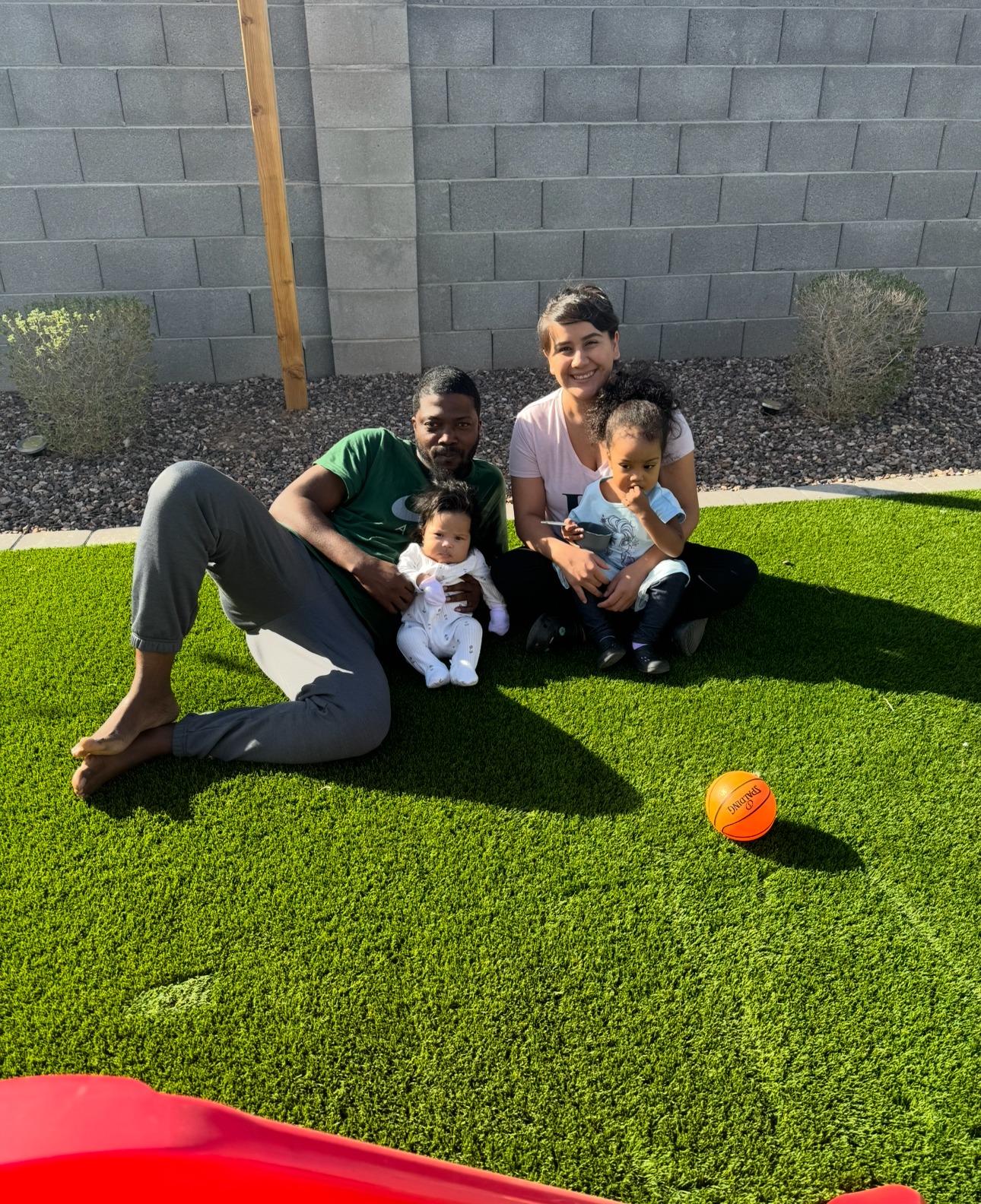 Honoring Adedamola-supporting his wife and two children. campaign photo, 2 of 4