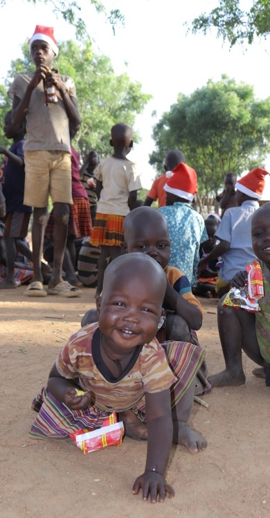 CHRISTMAS OUT-REACH donation to children of Karamoja Uganda campaign photo, 2 of 6