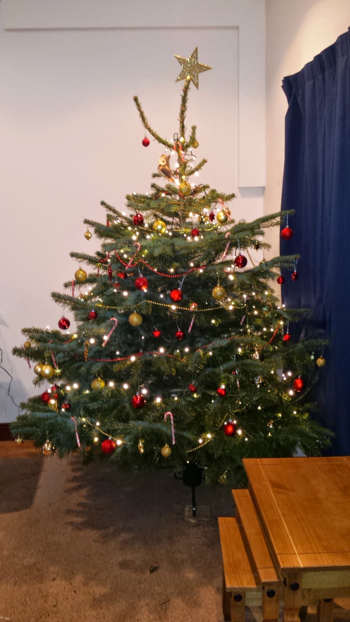 Women in a refugee give their children a magical Christmas campaign photo, 2 of 4