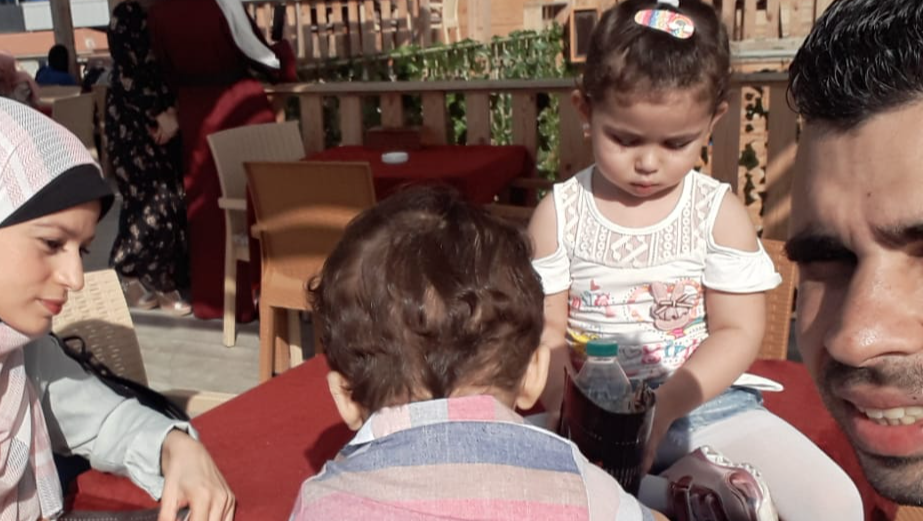 Three children -including a newborn- trying to survive ... photo