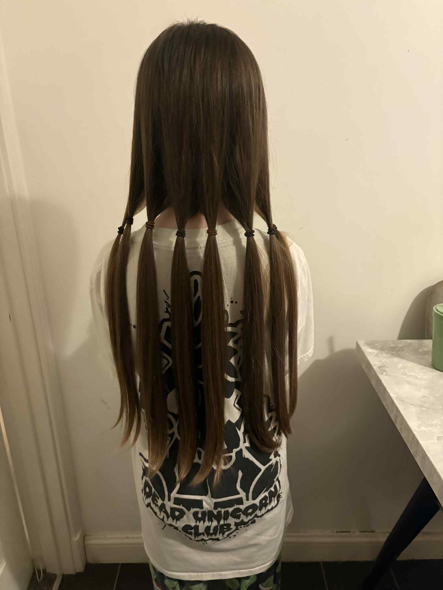 Georgie cut her hair for charity campaign photo, 4 of 7