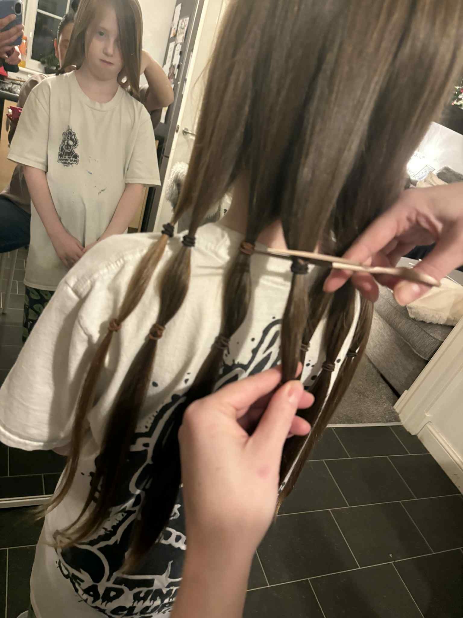 Georgie cut her hair for charity campaign photo, 5 of 7