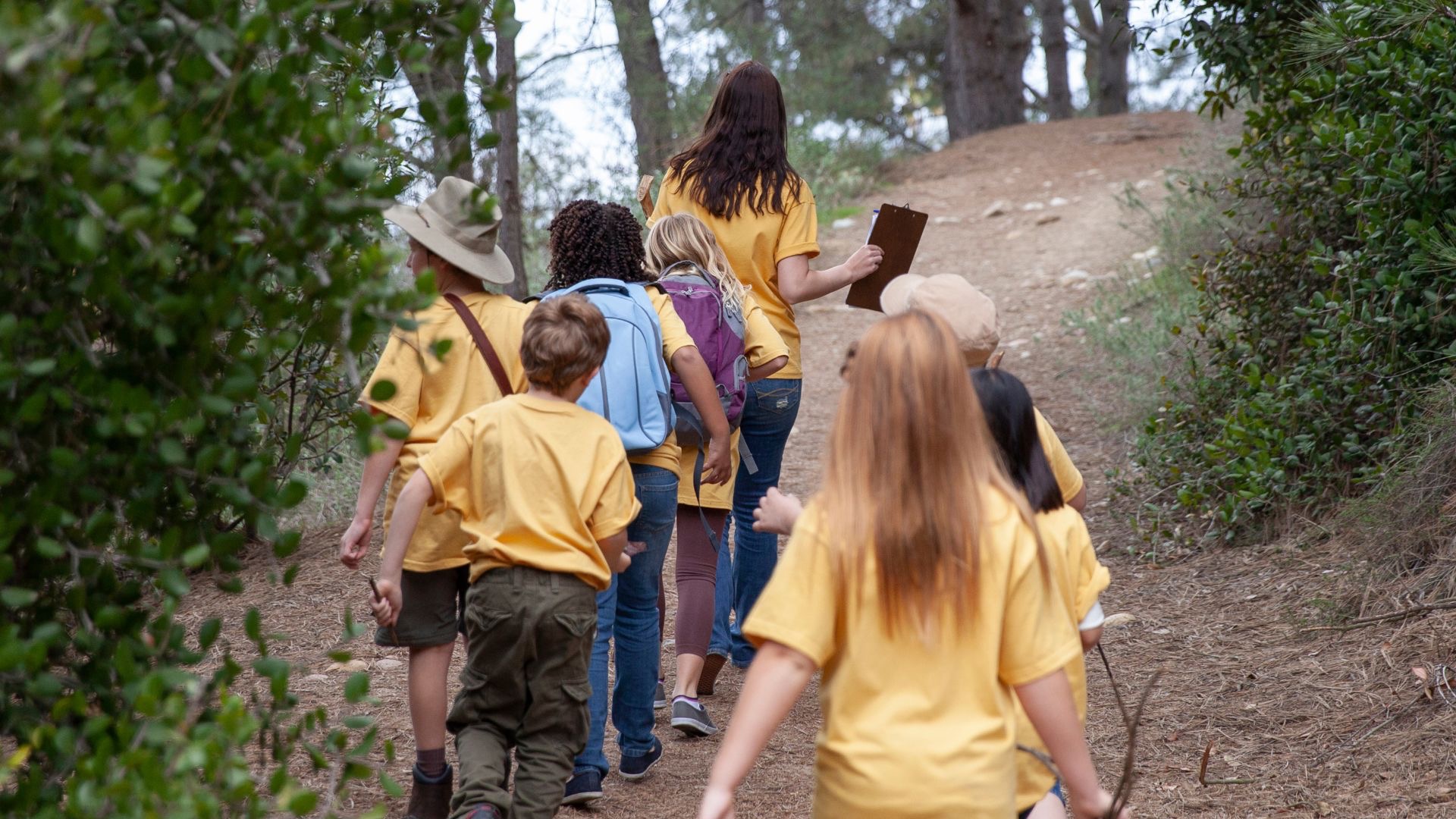 A safe, secret camp for survivors of domestic violence 2027 campaign photo, 2 of 8