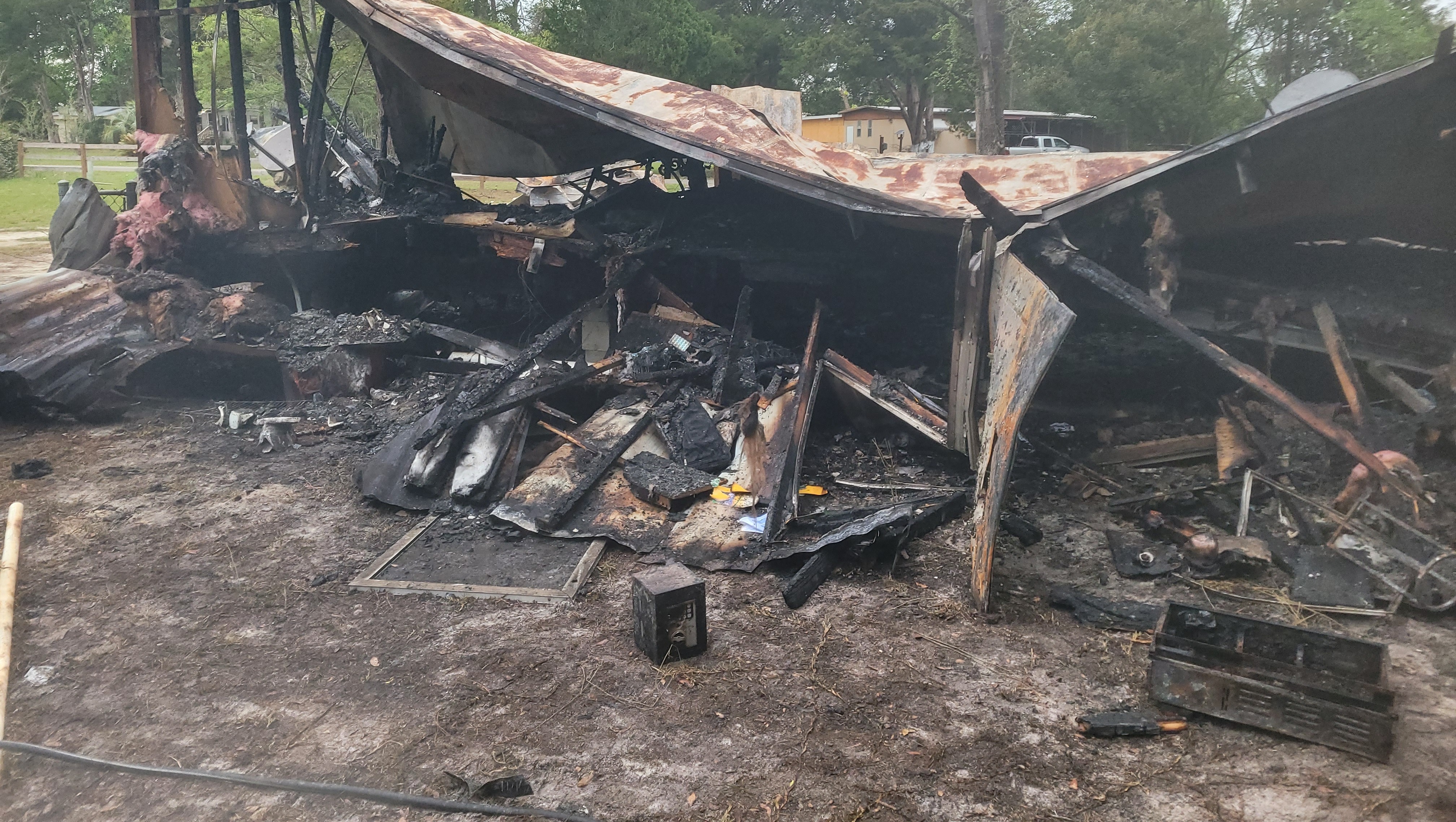 Help Latia Rebuild After House Fire photo