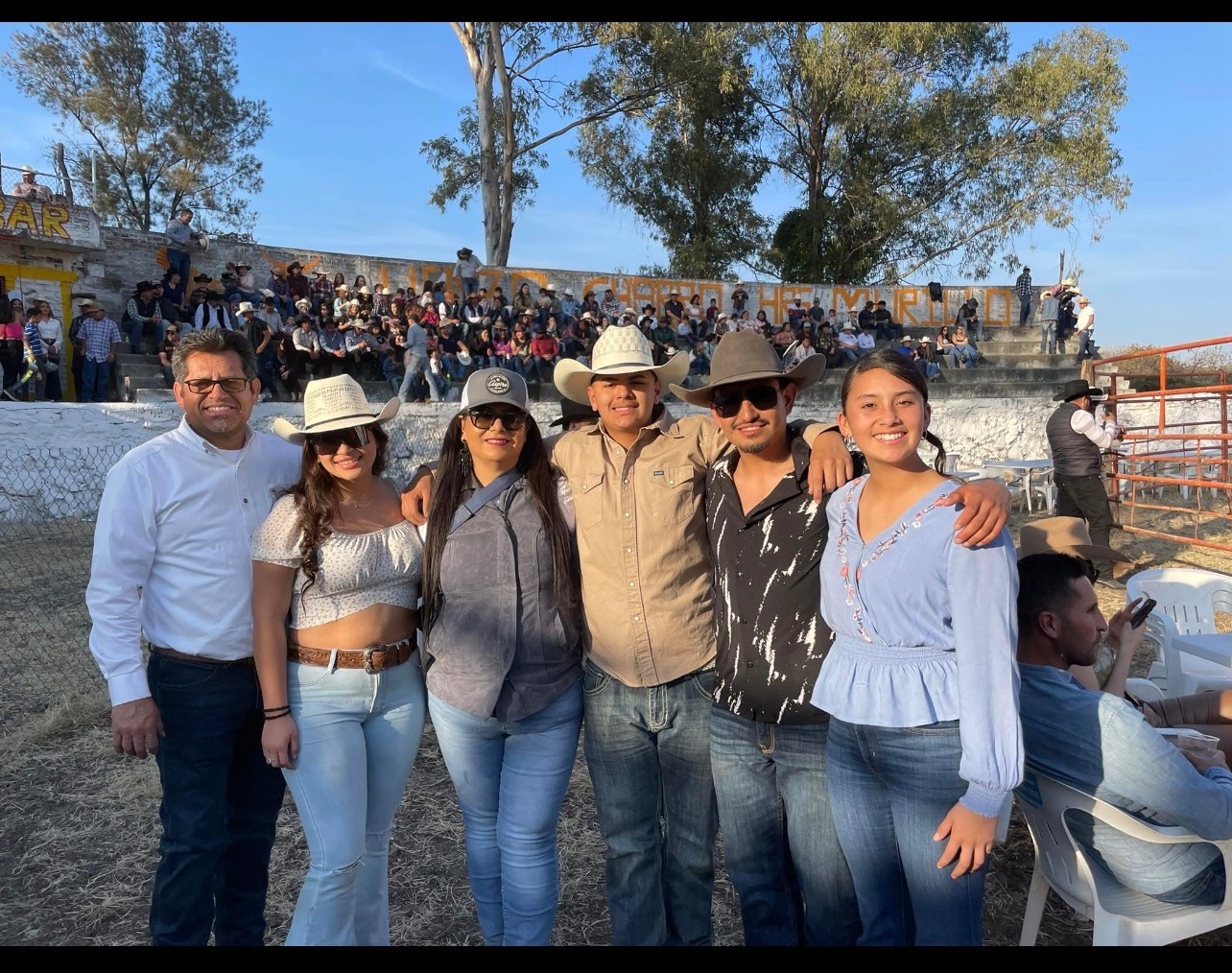 Standing with Vanessa and her kids in their Time of Need campaign photo, 5 of 8
