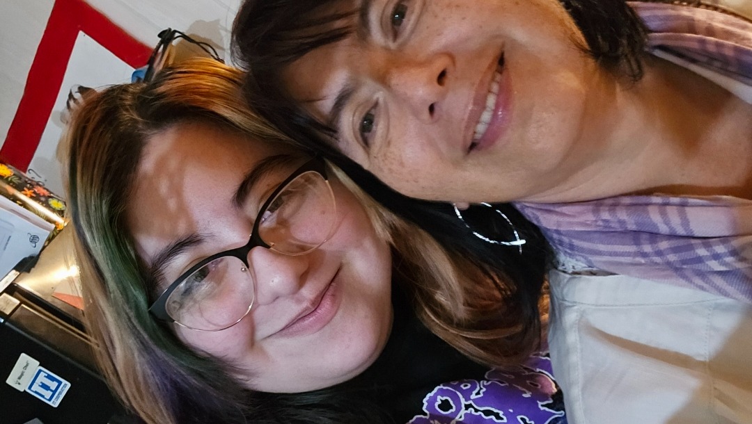 Aid Hiro from abusive dad by helping them get away photo